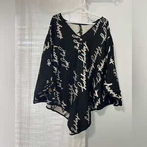 Melissa McCarthy Throw over